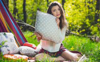 Woman sitting pillow outdoors nature - product photo free wallpaper for desktop