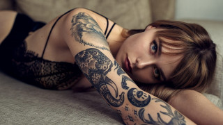 Woman tattoo laying couch arm - christen dalsgaard free wallpaper
