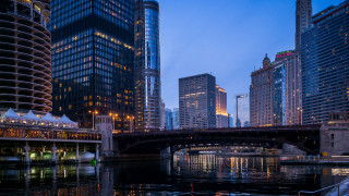 City night bridge river skyscrapers - the background and a boat free wallpaper