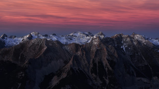 Mountain range pink sky clouds 15 - a view of a mountain range free wallpaper for desktop