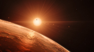 Bright sun distant planet space - a bright sun free wallpaper