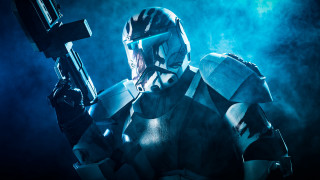 Futuristic man helmet robot gun - conroy maddox free wallpaper