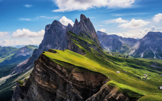 Mountain range grassy valley sheep - the grass below free wallpaper