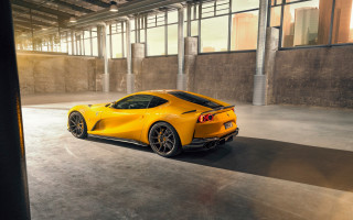 Yellow sports car garage sunlight - side profile free wallpaper