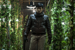 Man black jacket hat green - movie still free wallpaper