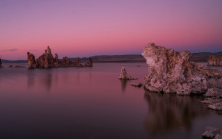 Purple sky rocks water mountains - rock free wallpaper