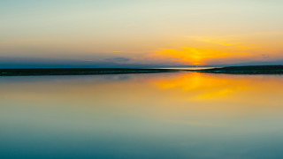 Sunset lake boat clouds orange - a sunset over a lake free wallpaper