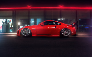 Red sports car night building - its light free wallpaper for desktop