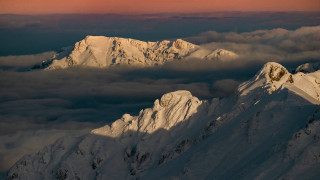 Snowy mountain pink sky clouds 2 - auseklis ozol free wallpaper for desktop