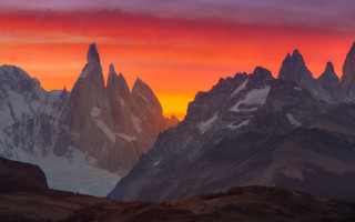 Mountain range red sky clouds - a red sky in the background free wallpaper for desktop