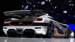 White black sports car showroom - a showroom free wallpaper