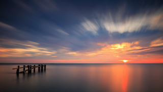 Sunset ocean dock misty colors - mystical free wallpaper for desktop