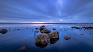 Lake rocks cloudy sky beach - auseklis ozol free wallpaper for desktop