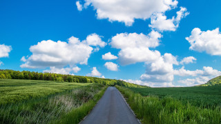 Road field clouds grass sky - a sky free wallpaper for desktop