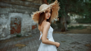 Woman white dress straw hat - a brick road in front free wallpaper