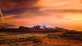 Mountain snow capped peak sunset - peak in the distance free wallpaper for desktop