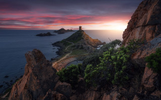 Lighthouse rocky cliff ocean sunset 9 - a rocky cliff free wallpaper