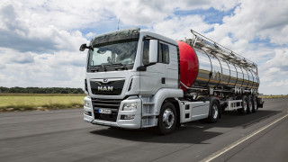 Large truck cloudy sky tanker - a road under a cloudy sky free wallpaper