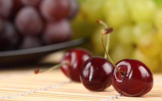 Cherries grapes bokeh blurry food - art green free wallpaper for desktop