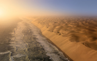 Sandy beach water sunset desert - a sandy beach free wallpaper for desktop