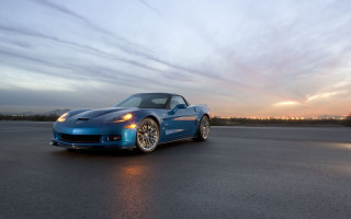 Blue sports car sunset clouds - a sun setting free wallpaper