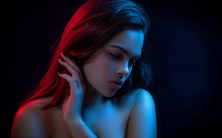 Red haired woman dark posing - a picture in the dark free wallpaper