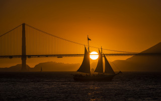 Sailboat ocean sunset bridge horizon - sunset free wallpaper