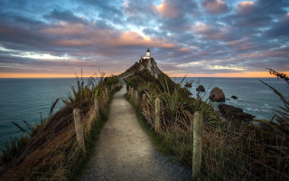 Lighthouse path cliff ocean sunset - a path free wallpaper
