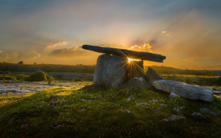 Rock formation sunset grass rocks - a rock formation in the foreground free wallpaper