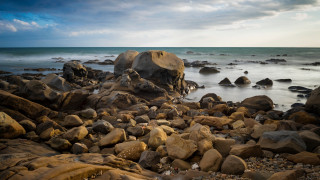 Rocky beach large formation ocean - australian tonalism free wallpaper for desktop