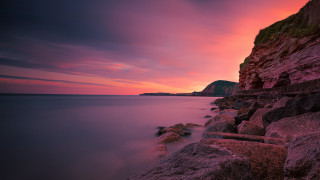 Sunset ocean rocks cliff landscape - rock and water free wallpaper