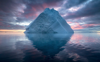 Iceberg sunset reflection cloudy sky - photograph free wallpaper for desktop