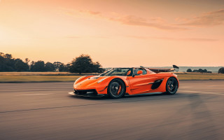 Orange sports car sunset road - a orange sports car free wallpaper