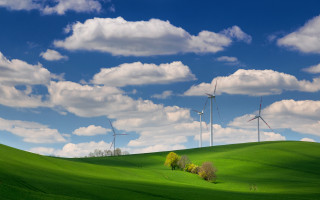 Green field wind turbines clouds - a green field free wallpaper for desktop