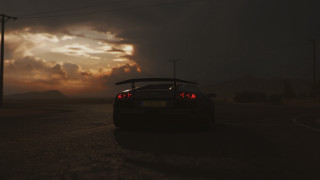 Car road cloudy sunset horizon - a hill in the distance free wallpaper