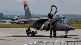 Fighter jet airport man green - top of an airport tarmac next free wallpaper