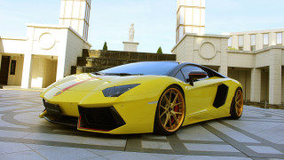 Yellow sports car clock tower - circular free wallpaper