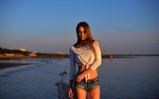 Woman beach denim shorts sunset - her pocket free wallpaper for desktop