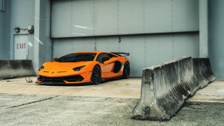Bright orange sports car garage - orange sports car free wallpaper