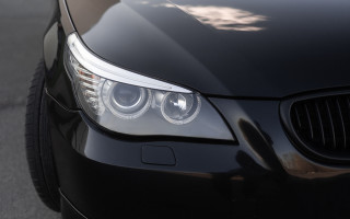 Black car headlight white stripe - a black car free wallpaper