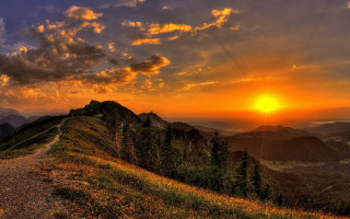 Sunset mountain trail trees autumn - a sunset over a mountain free wallpaper