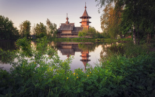 Lake church trees bushes flowers - a few yellow flower free wallpaper
