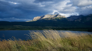 Lake mountains cloudy sky tallgrass - mountain under a cloudy sky free wallpaper