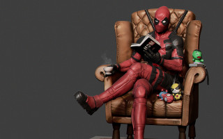 Deadpool bald sitting armchair reading - a toy free wallpaper