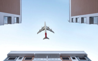 Airplane building sky minimalism tiltshift - a plane free wallpaper for desktop