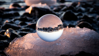 Snow globe ice rocks water - top of a rock free wallpaper
