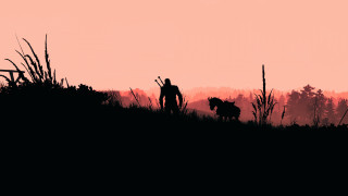 Silhouette dog man sunset grass - the sun setting behind them free wallpaper for desktop