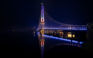 Bridge night city lights reflection - boleslaw cybi free wallpaper