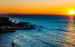 Sunset ocean boat mountains hills - a few hill free wallpaper