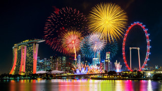 Fireworks city ferriswheel night sky - free new year wallpaper